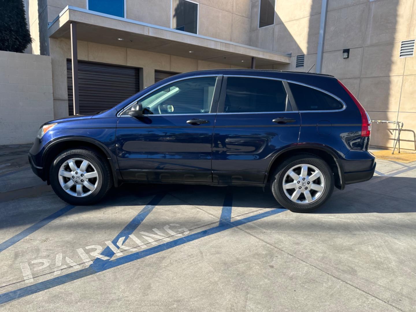 2007 Blue /Gray Honda CR-V EX 4WD AT (JHLRE48577C) with an 2.4L L4 DOHC 16V engine, 5-Speed Automatic Overdrive transmission, located at 30 S. Berkeley Avenue, Pasadena, CA, 91107, (626) 248-7567, 34.145447, -118.109398 - 4WD! This 2007 Honda CR-V EX 4WD looks and drives good. Don't let bad credit or financial setbacks hold you back from owning a dependable vehicle. At our BHPH dealership, we're here to make the car-buying process as smooth and stress-free as possible. We invite you to visit our dealership in Pasa - Photo#1